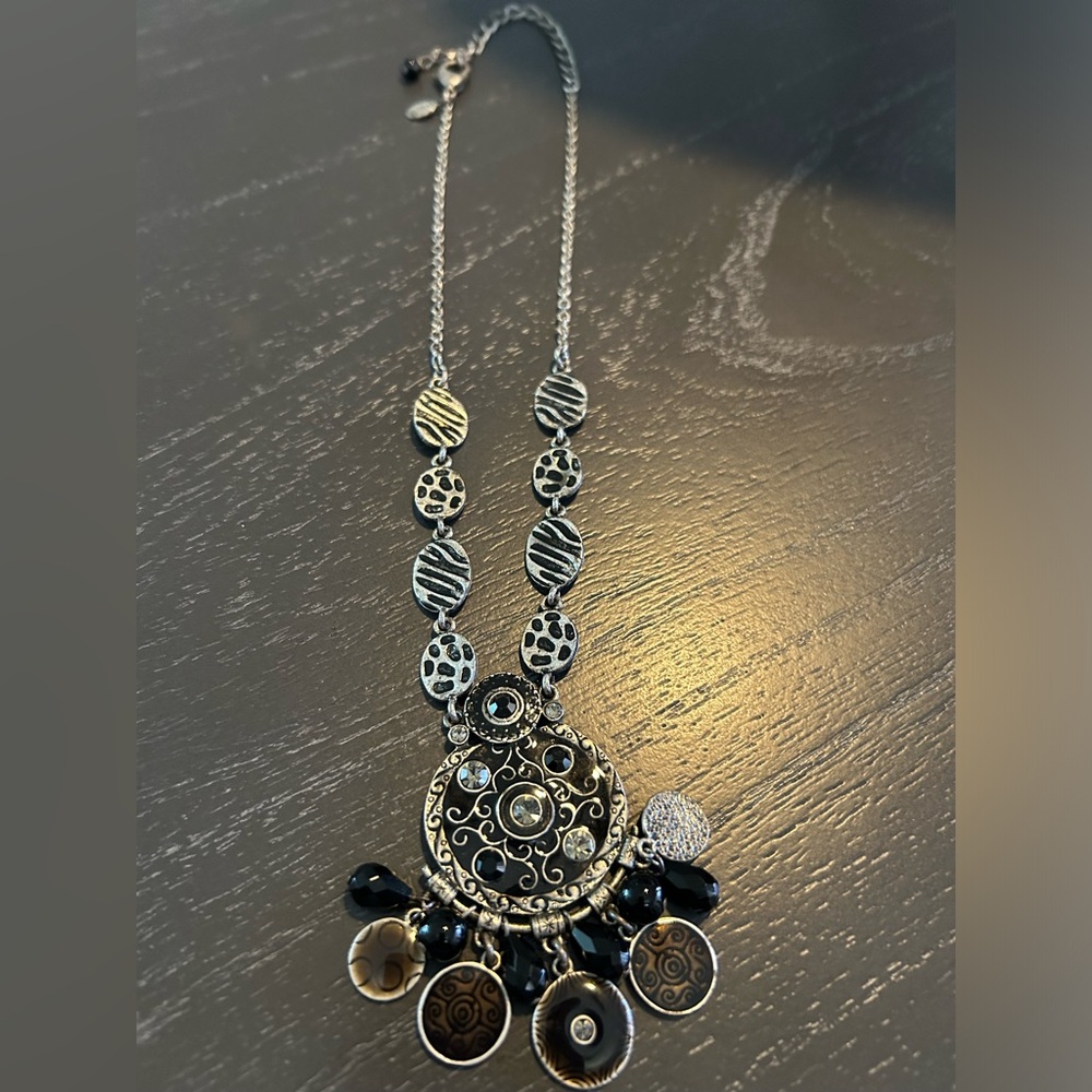 Chicos necklace hangs 11 inches from last hooksm